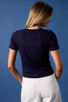 RARA Boutique embroidered American flag martini cocktail ribbed baby tee, white short-sleeve shirt with flag and cocktail design.