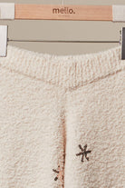 Mello Christmas tree sweater pants featuring festive holiday patterns, cozy knit fabric, and a comfortable fit.
