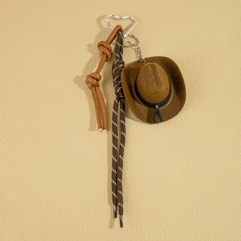 Mini cowboy hat Western rope bag charm with rustic design, featuring a small hat and rope detail for accessories.