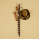 Mini cowboy hat Western rope bag charm with rustic design, featuring a small hat and rope detail for accessories.