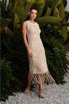 Cowrie shell fringe open knit dress by RARA Boutique featuring a flowing silhouette and bohemian style.