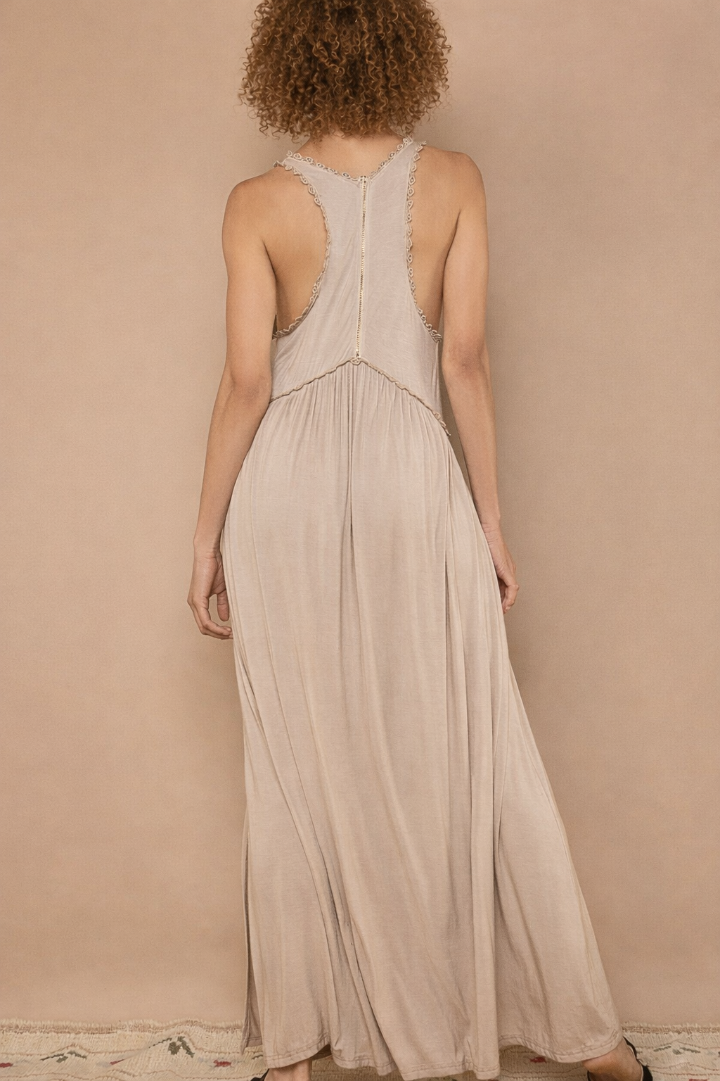 Taupe baby doll side slit cut-out maxi dress by RARA Boutique, featuring a flowy silhouette and stylish design.
