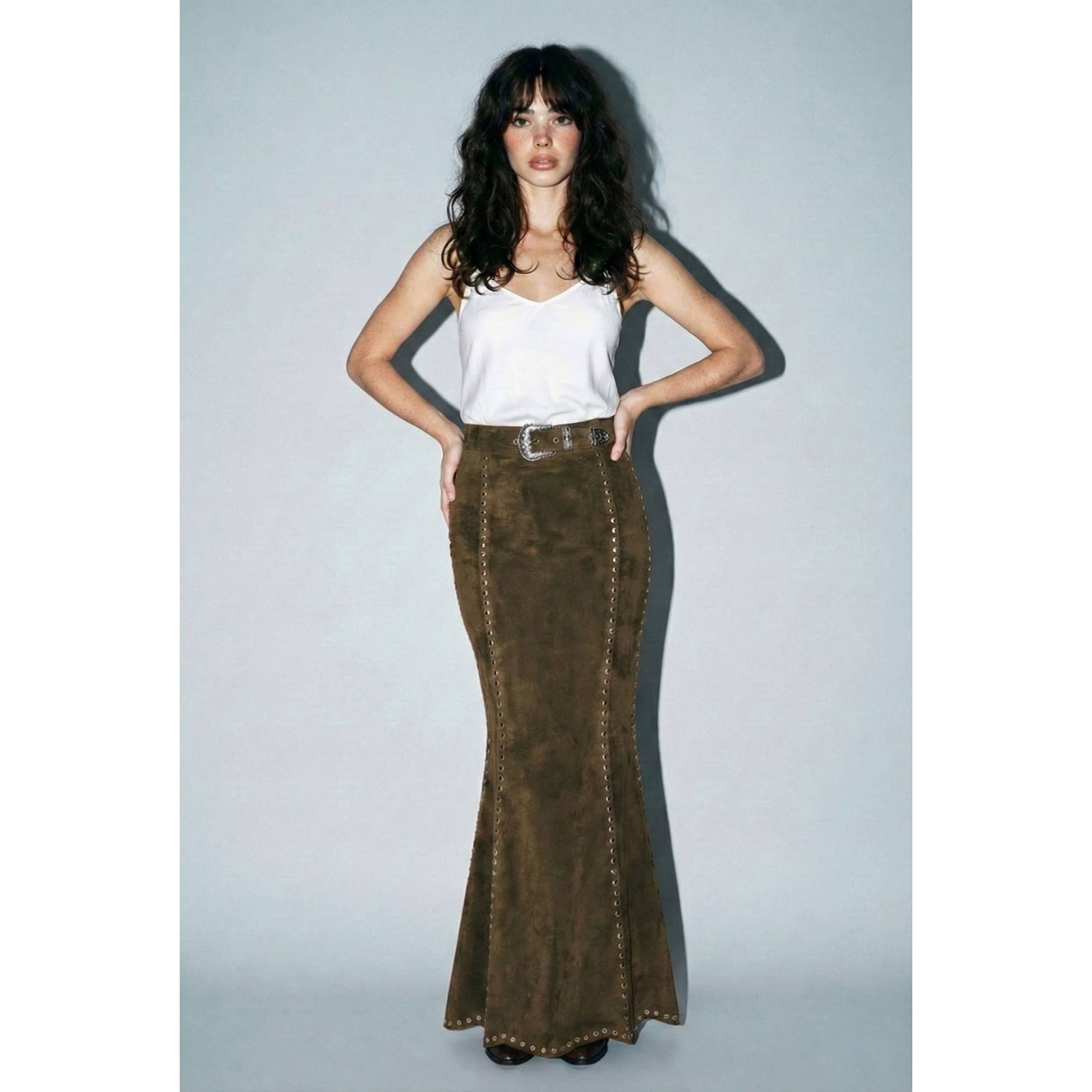 Skylar Rose suede studded maxi skirt with a flowing silhouette and studded details, shown in a close-up view.