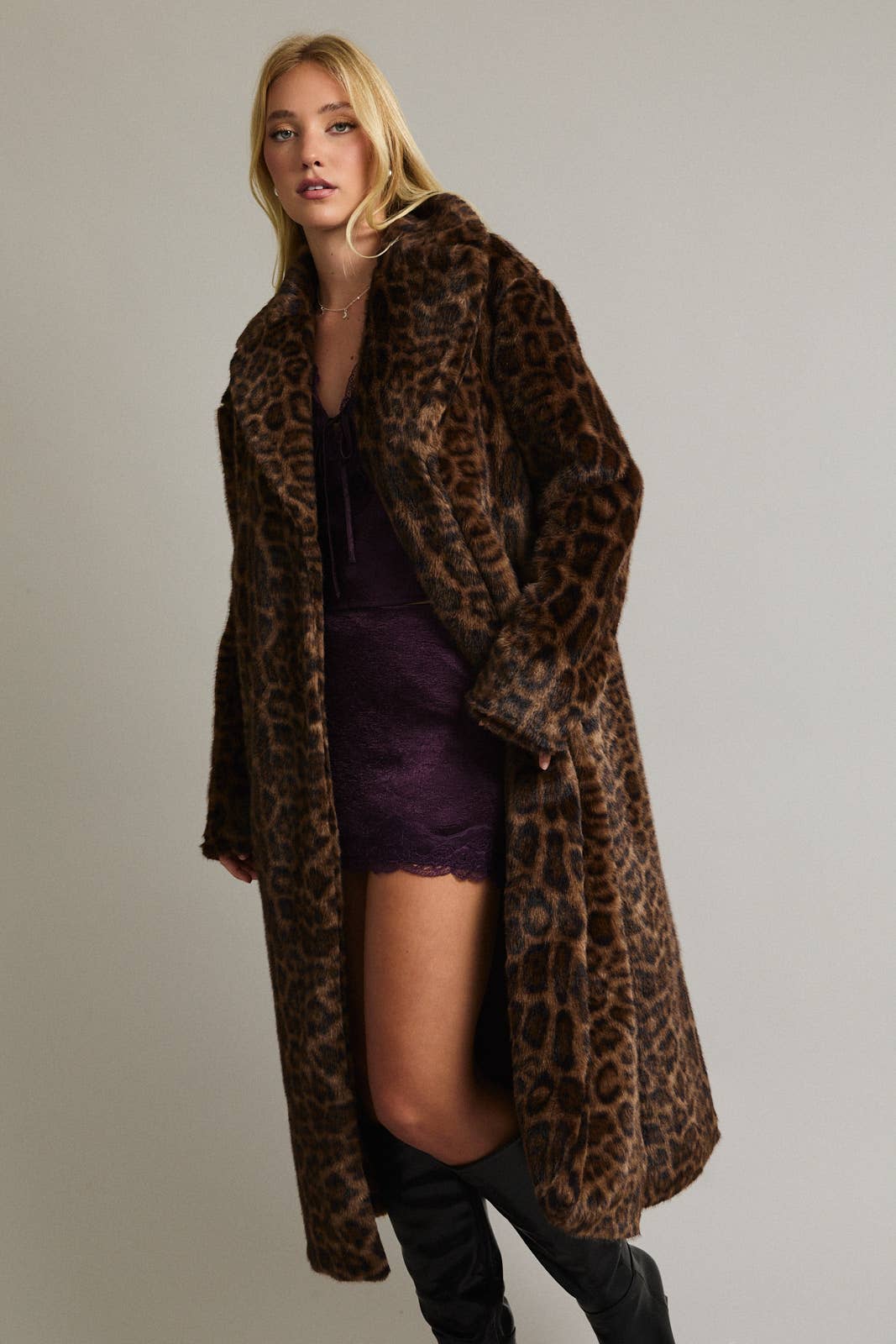 Le Lis faux fur long coat jacket with plush texture, featuring a stylish and cozy design perfect for winter wear.