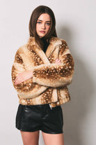 LE LIS faux deer print high neck zip jacket with stylish design and high collar, displayed on a hanger.