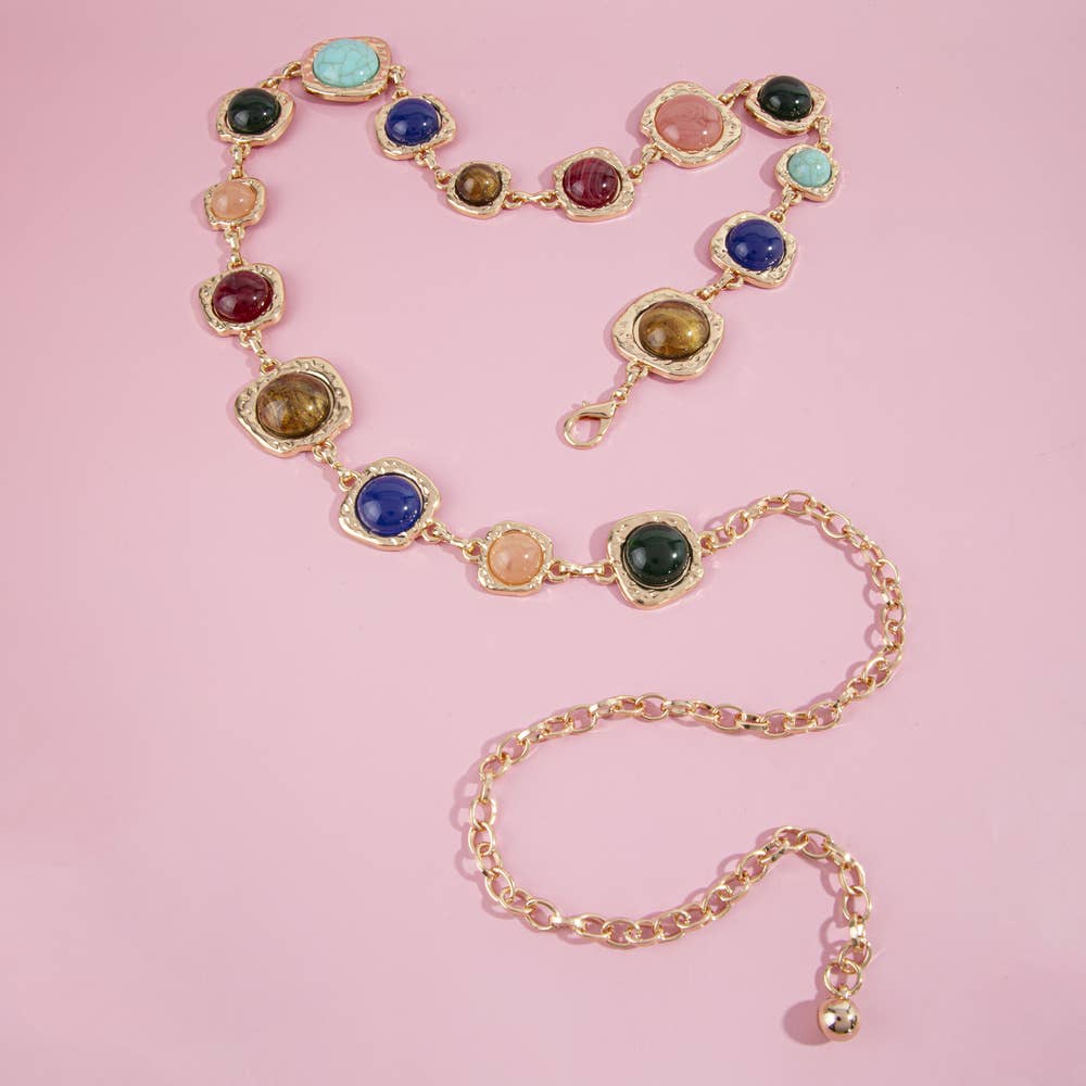 Gemstone cabochon station chain belt by Collections by Fame Accessories, featuring colorful polished stones along a sleek metal chain.