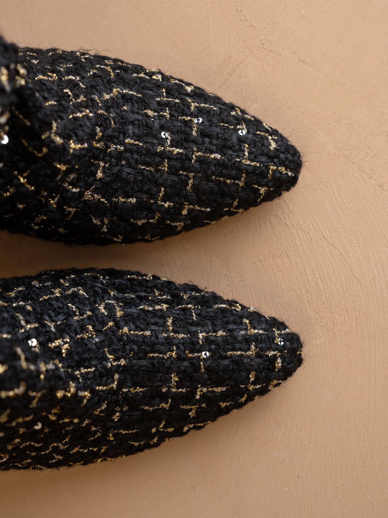 Black tweed slouch heel fall bootie from Oasis Society featuring a stylish, textured design and a comfortable slouch fit.