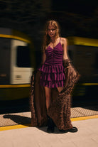 Le Lis faux fur long coat jacket with plush, textured fur in a stylish design, perfect for cold weather wear.
