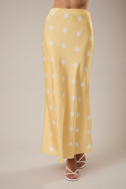 RARA Boutique polka dot satin maxi skirt with elastic waistband, flowing design and stylish pattern for a chic look.