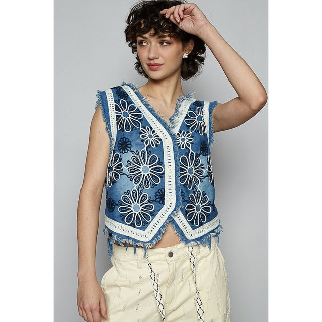 Crochet floral V-neck denim vest by RARA Boutique featuring intricate floral crochet details and classic denim fabric.