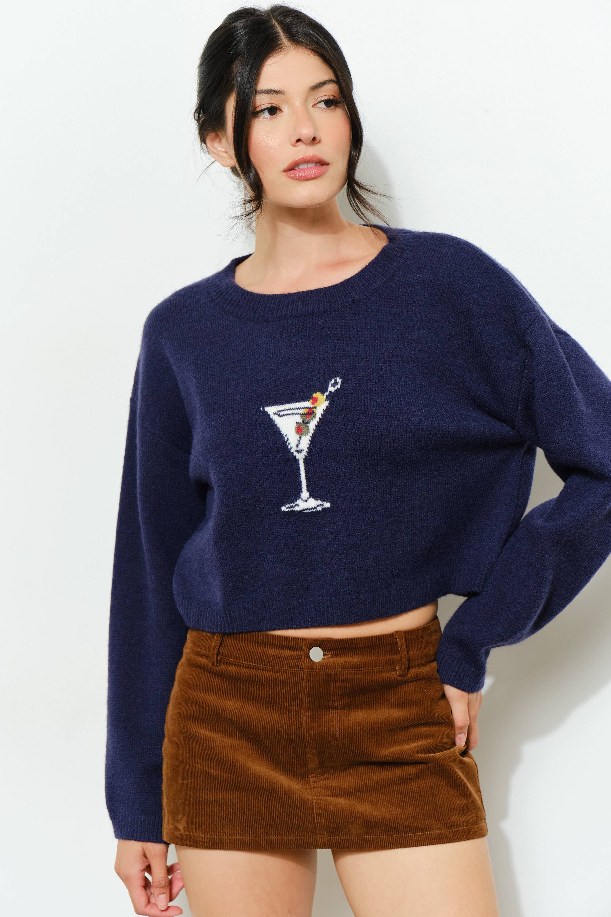 Pretty Garbage KAINA Martini Sweater in soft knit, featuring a relaxed fit and stylish design, displayed on a mannequin.