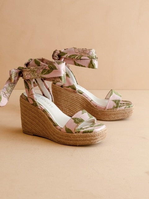 RARA Boutique Rose Garden floral espadrille wrap wedge sandal with braided jute sole and ankle ties, featuring vibrant rose print design.