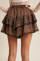 Leopard tiered ruffle lace trim skort by RARA Boutique, showcasing a stylish layered design with ruffles and lace details.