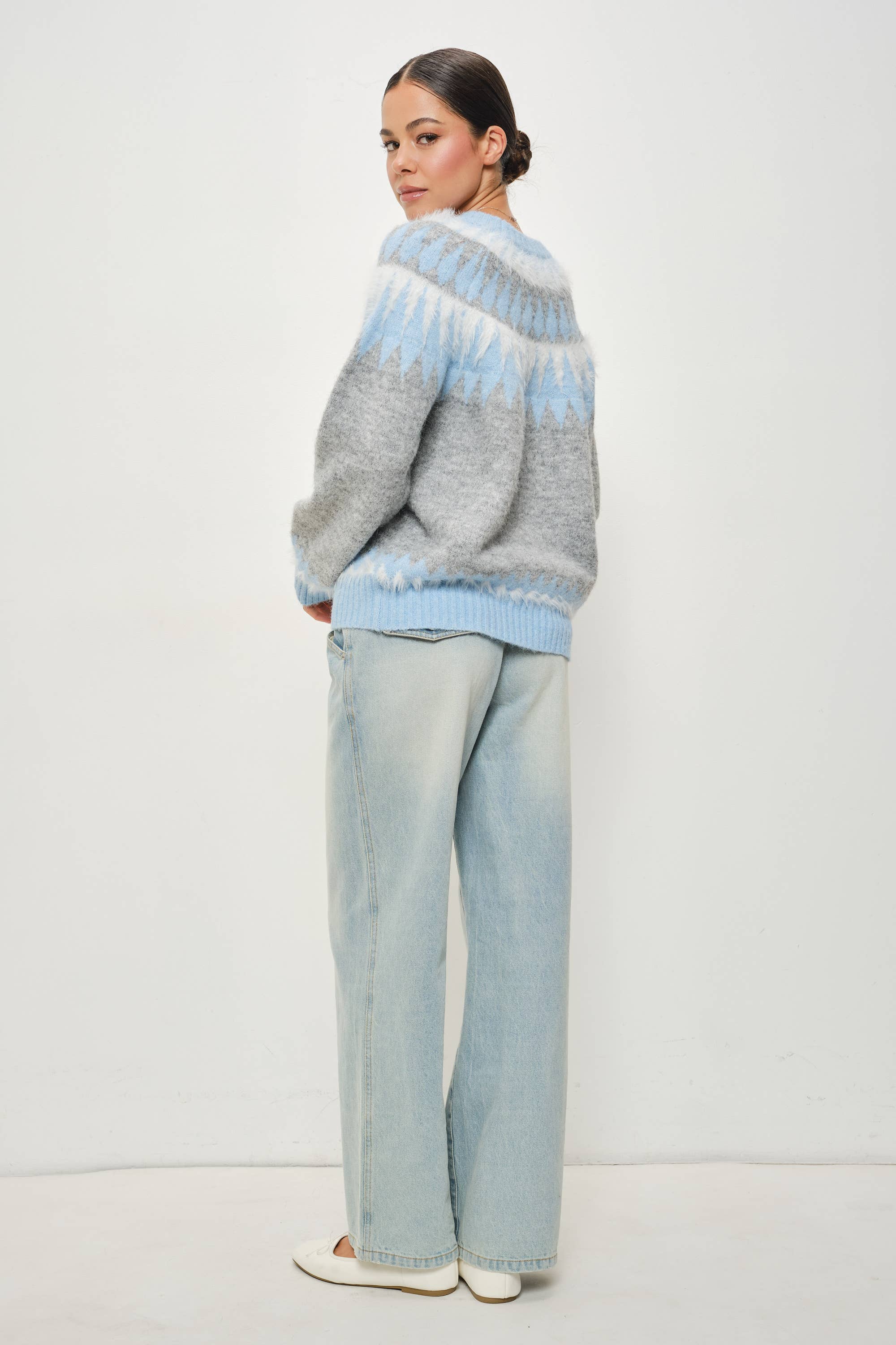 Pretty Garbage Kenzie Faire Isle crewneck pullover, showing a cozy, cream-colored knit sweater with a relaxed fit and ribbed cuffs.