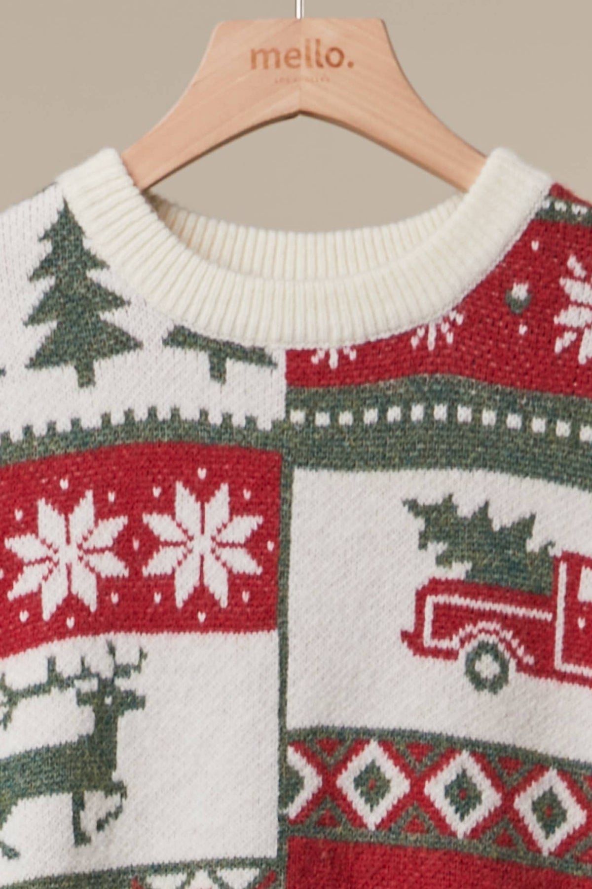 Mello Nordic Christmas knit sweater featuring festive pattern, cozy wool material, and holiday-themed design.