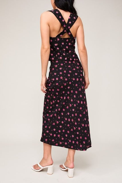 High waisted floral rose printed bias midi skirt by RARA Boutique featuring a flowing design and vibrant flower pattern.