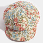 Floral tapestry newsboy cabbie hat by Collections by Fame Accessories with colorful floral pattern and classic newsboy style.