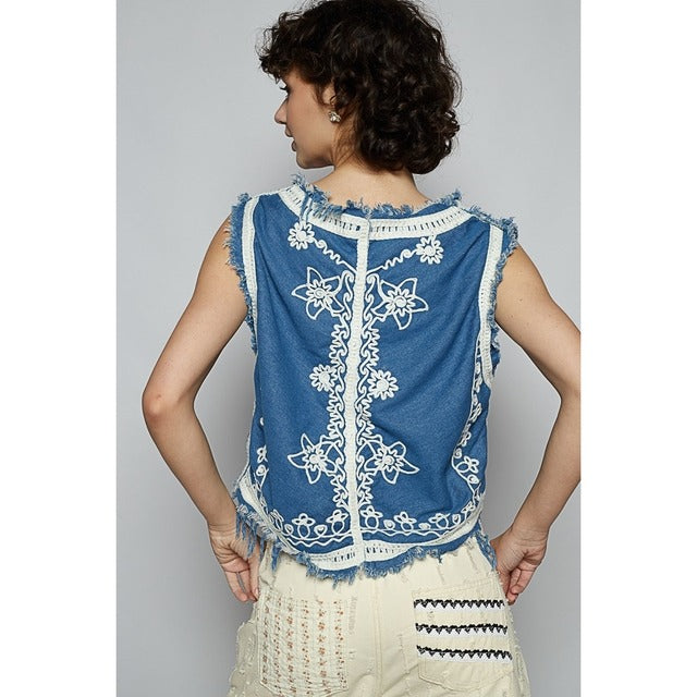 Crochet floral V-neck denim vest by RARA Boutique featuring floral embroidery and a stylish V-neck design.