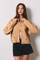 LE LIS horse graphic crew neck cardigan featuring a colorful horse design on soft knit fabric.