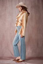 Blue B 25004J Buckled Deer Print Faux Fur Jacket showing the front with buckled straps and deer pattern details.