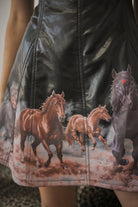 Blue B Western faux leather mini dress with horse print, featuring a fitted silhouette and stylish design.
