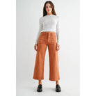 Mica Denim high-rise wide crop jeans with patch pockets and distressed details, styled with a casual, relaxed fit.