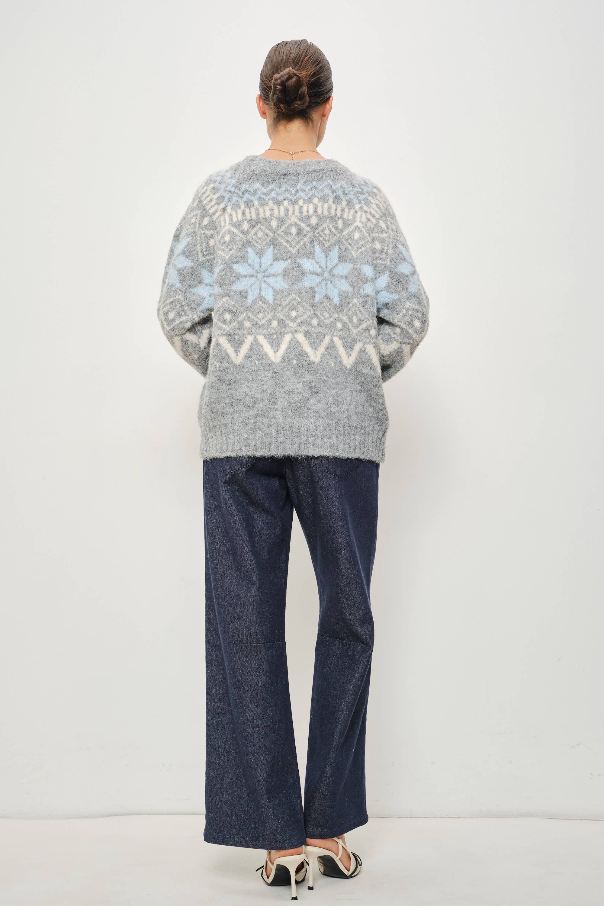 Pretty Garbage RIA Faire Isle crewneck knitted pullover with intricate fair isle pattern, soft wool blend, and ribbed cuffs and hem.