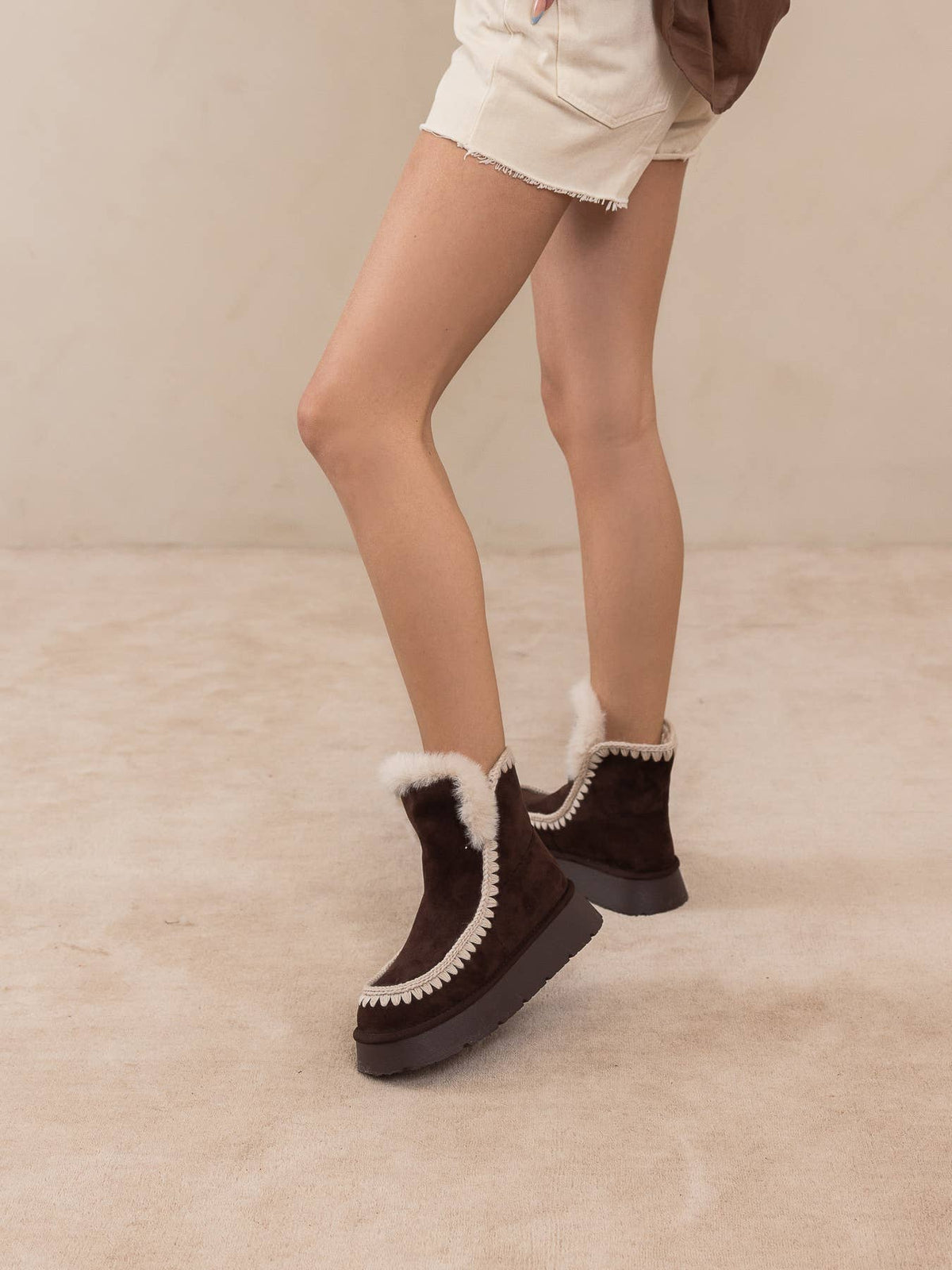 Oasis Society Joyce Coffee winter boot with shearling trim and platform sole, stylish and warm for cold weather wear.