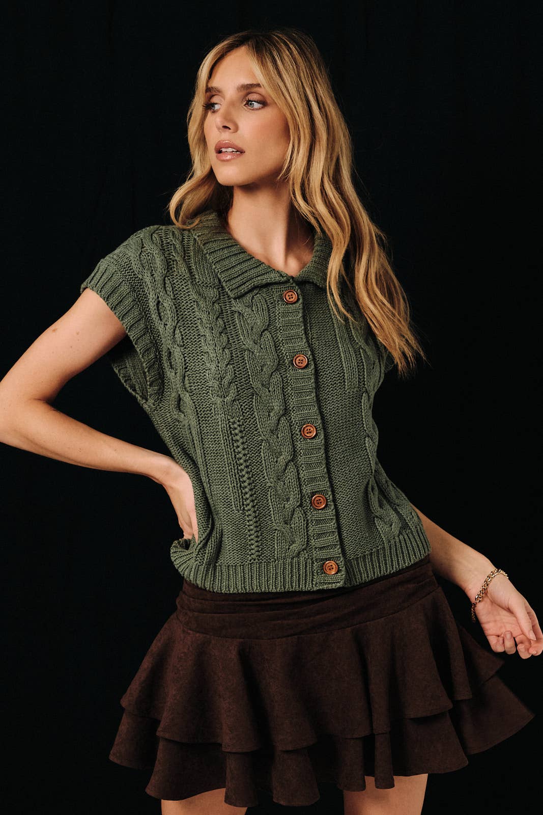 Cable knit button-up sweater vest by Sunday Edition, featuring a classic knit pattern and button details.