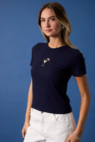 Embossed American flag design on ribbed baby tee by RARA Boutique, featuring embroidered details and a casual fit.