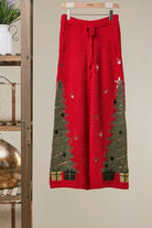 RARA Boutique Christmas Tree plush knit wide-leg lounge pants featuring festive holiday tree patterns and cozy fabric.