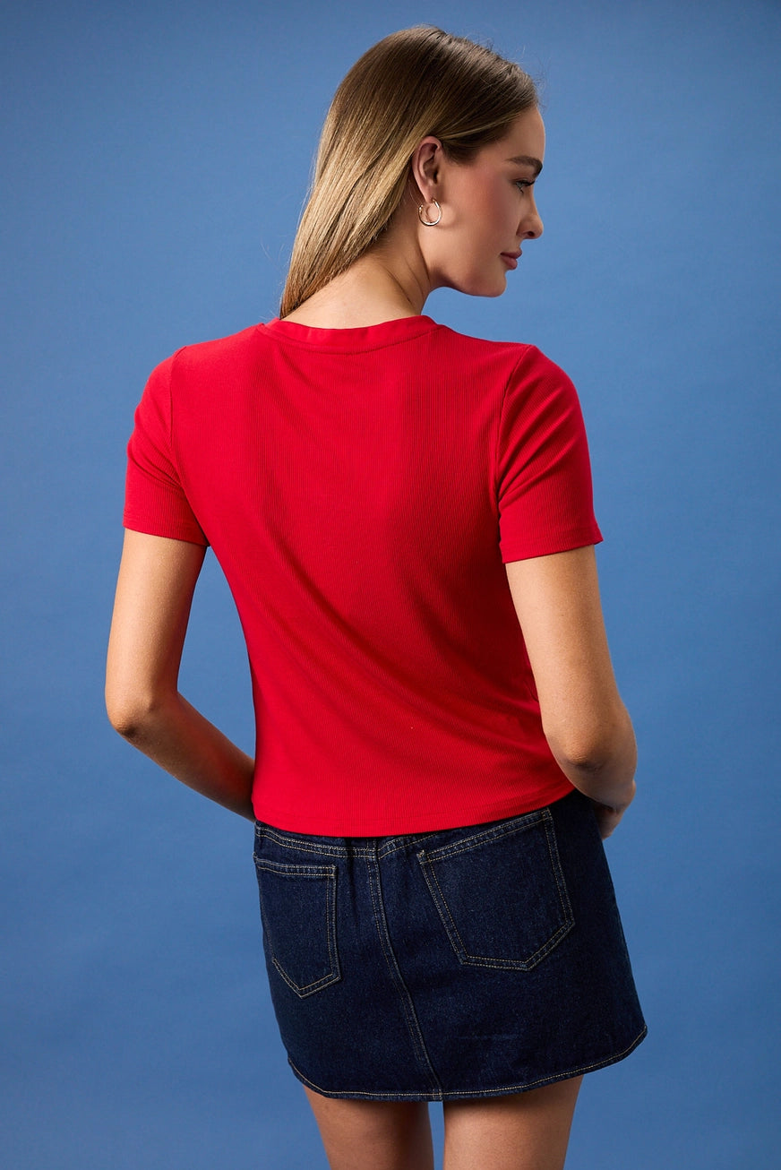 Embroidered American flag design on RARA Boutique baby tee featuring ribbed fabric and a casual martini cocktail theme.