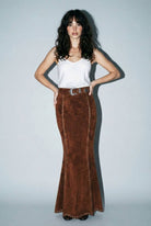 Skylar Rose suede studded maxi skirt featuring a flowing silhouette and studded embellishments.