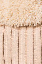 Long sleeve v-neck fur sweater rib jacket by LE LIS, featuring cozy fur texture and ribbed design, displayed on a hanger.