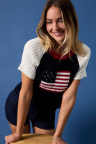 American flag raglan knit top blouse by RARA Boutique, short-sleeve casual shirt with patriotic star and stripe design.