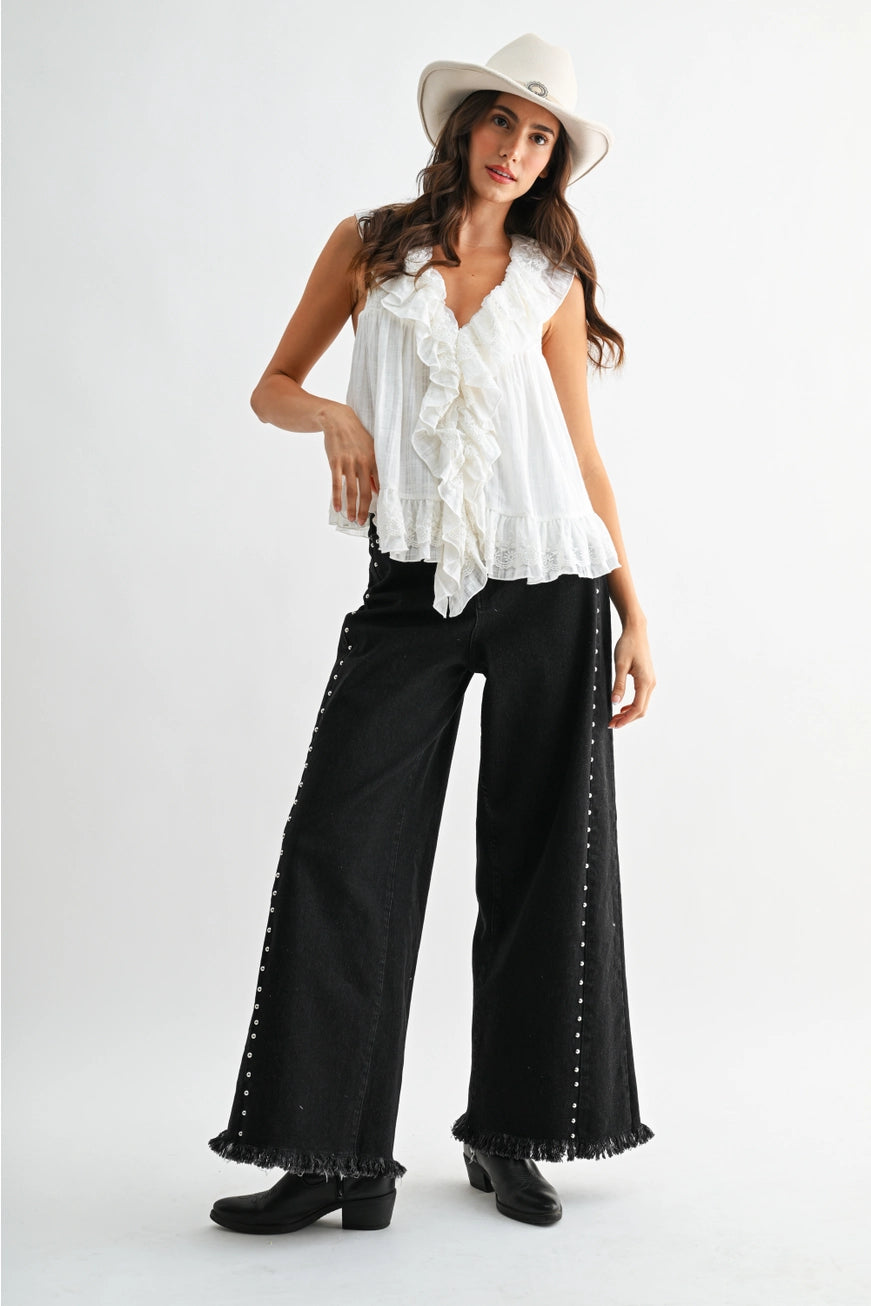 RARA Boutique studded ultra-wide leg washed jeans with distressed detailing and metal stud embellishments on light blue denim