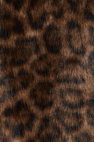Le Lis faux fur long coat jacket displayed on a model, showcasing plush texture and stylish design.