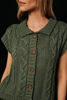 Sunday Edition by LE LIS cable knit button-up sweater vest, featuring a cozy textured knit and classic button details.