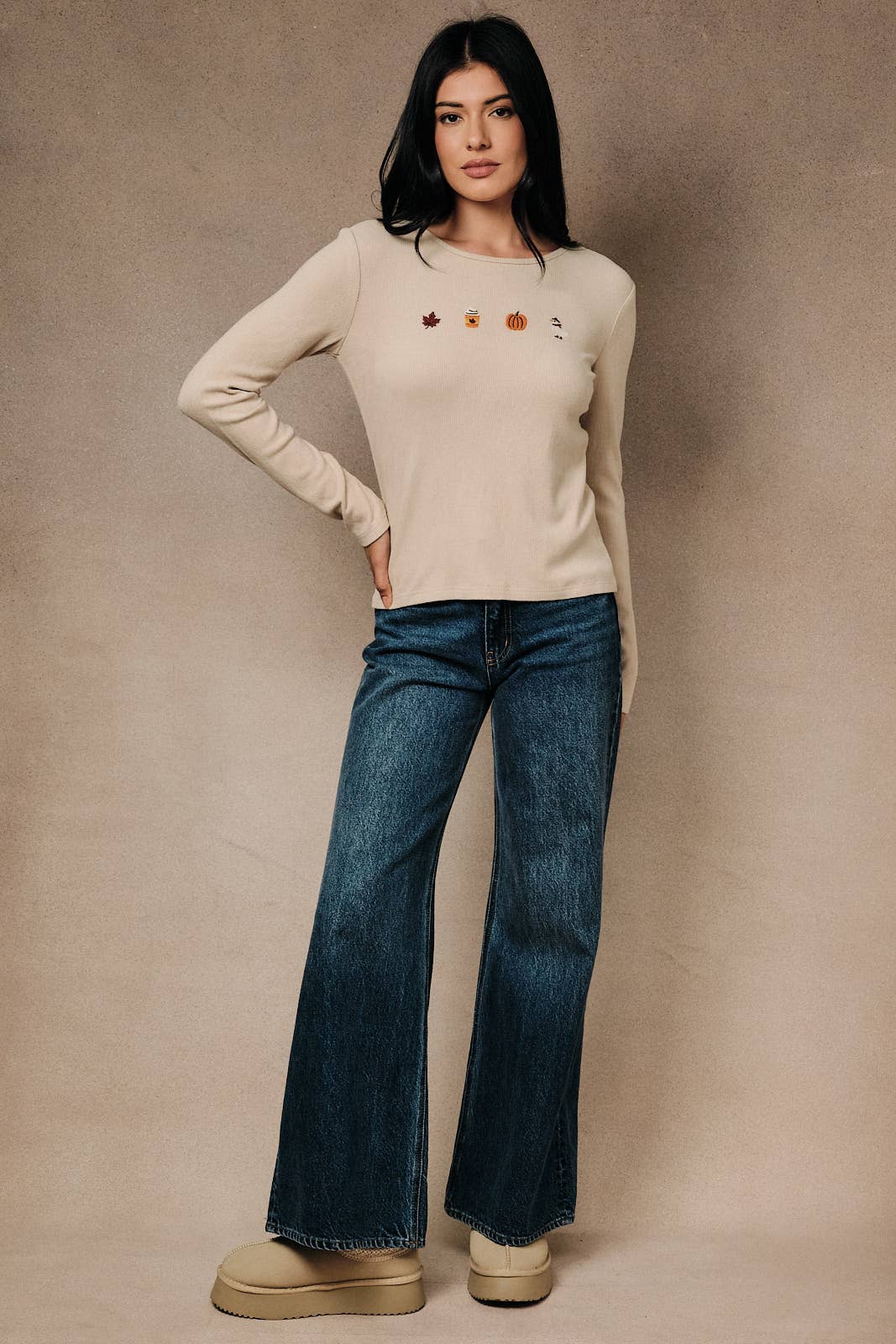 Round neck long sleeve ribbed top with fall-themed embroidery by Sunday Edition, featuring a cozy fall-inspired design and textured fabric.