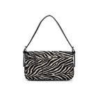 Urban Expressions Tuesday Gloria zebra shoulder bag with adjustable strap and stylish black and white animal print.