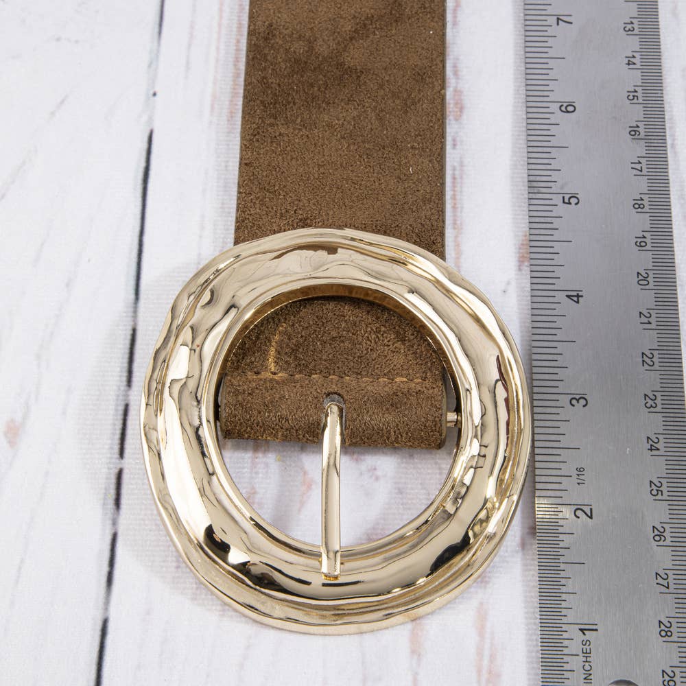 Suede hammered round buckle belt from Collections by Fame Accessories, featuring a textured leather strap and a round metal buckle.