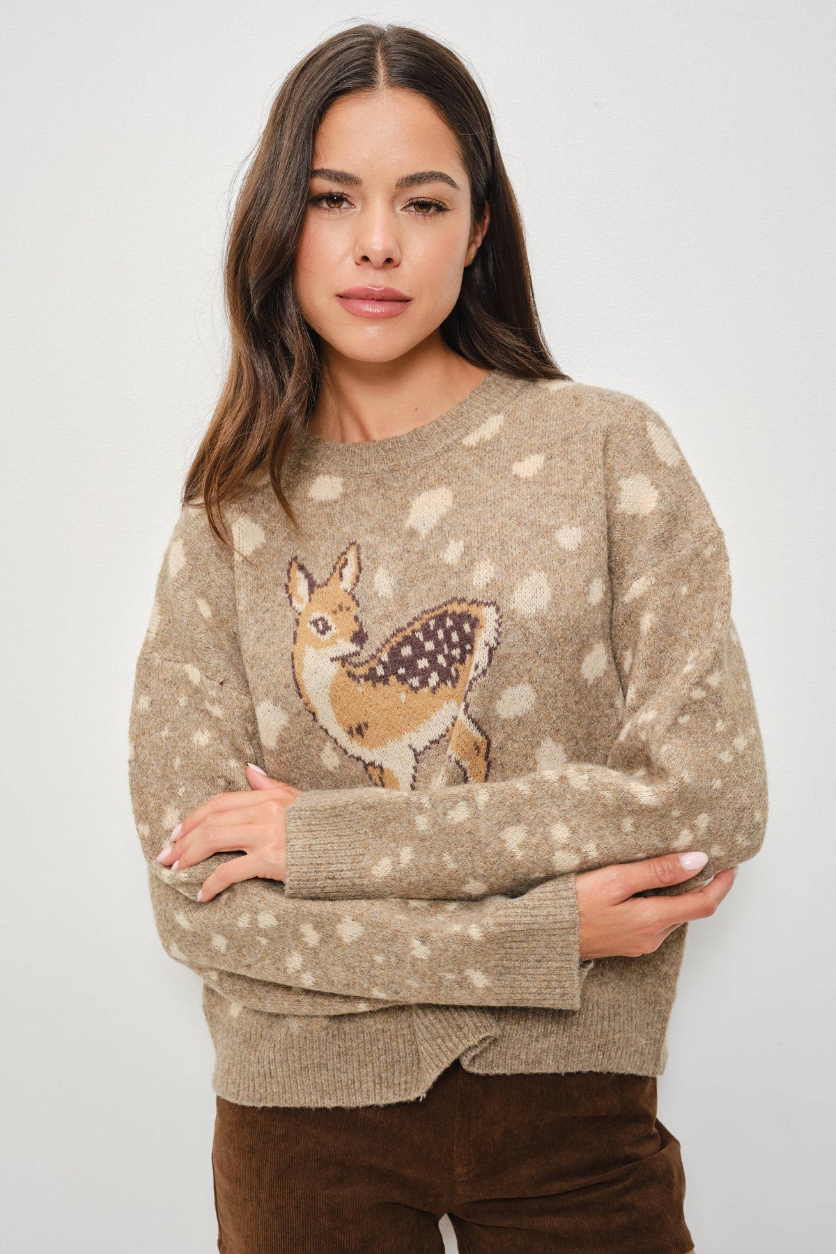 Pretty Garbage Tuesday deer print sweater with cozy knit fabric and a charming deer illustration on the front.