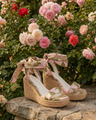 RARA Boutique Rose Garden floral espadrille wrap wedge sandals with tied ankle straps and colorful floral pattern.