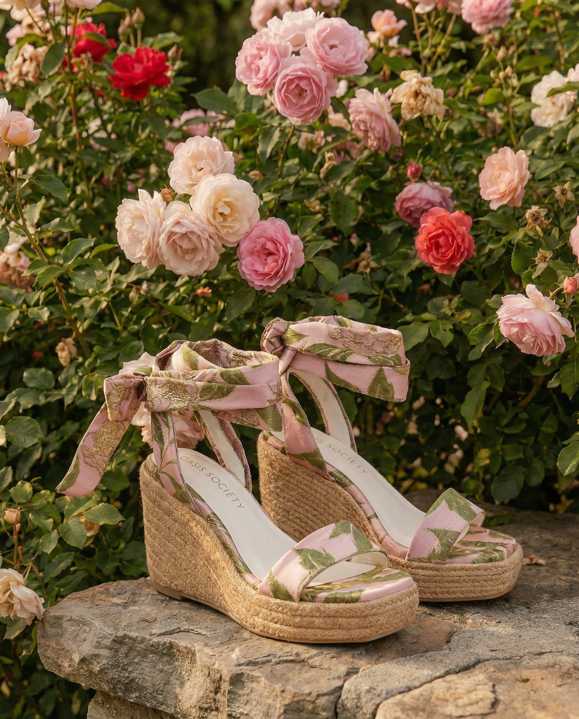 RARA Boutique Rose Garden floral espadrille wrap wedge sandals with tied ankle straps and colorful floral pattern.