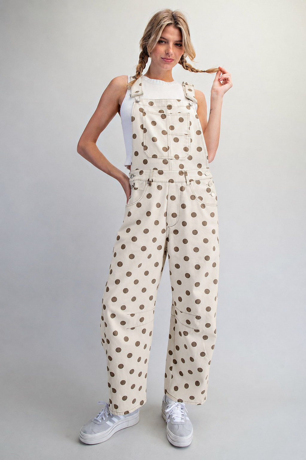 RARA Boutique polka dot barrel leg denim overalls with mineral washed finish, featuring adjustable straps and classic pocket design.