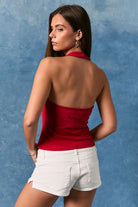 Red embroidered American flag patch halter neck tank top from RARA Boutique with stylish front design.