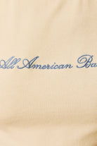Yellow embroidered All American Babe tank top from Le Lis by RARA Boutique, featuring patriotic star and stripe details.